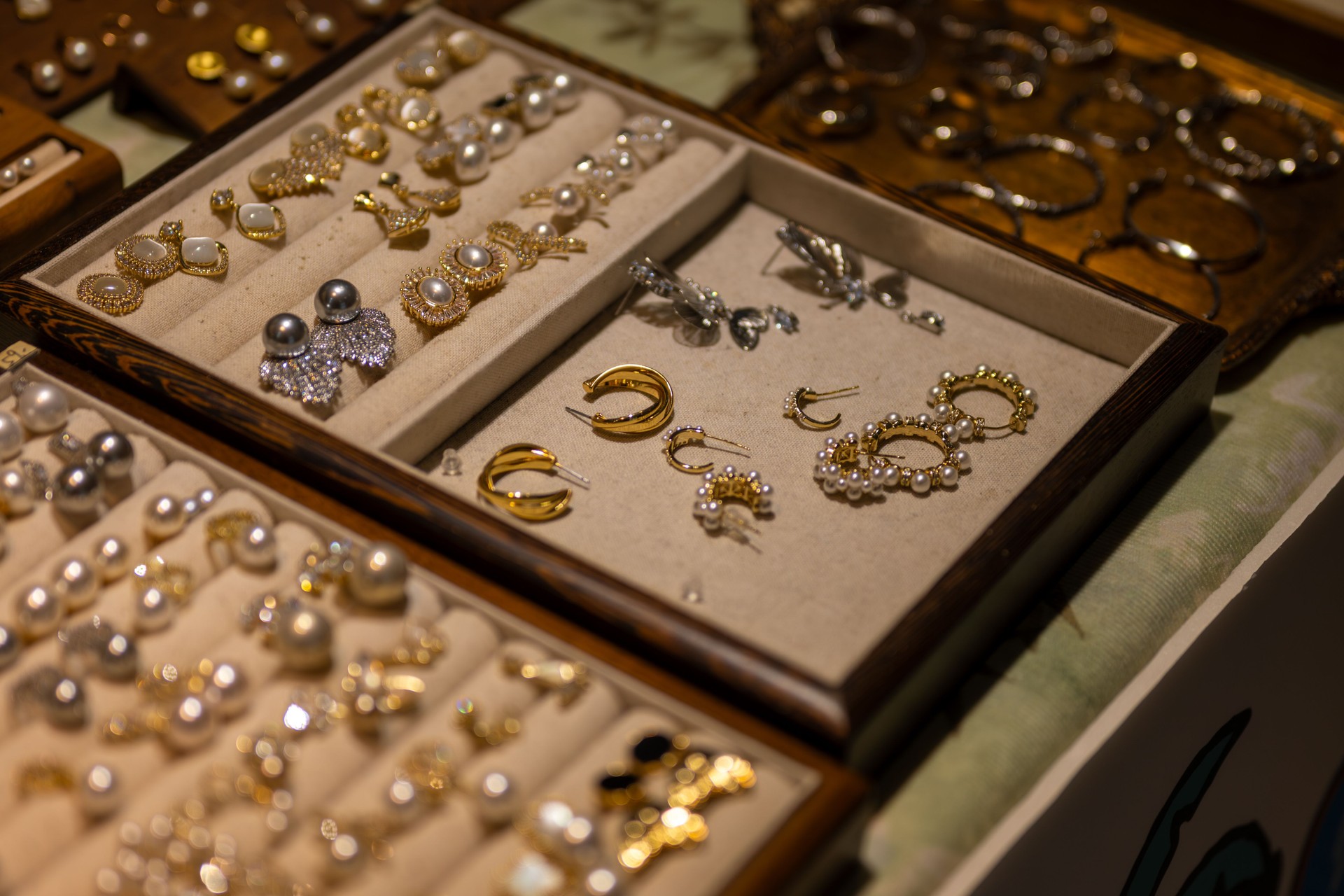 Elegant Jewelry Display Box with Various Earrings and Necklaces